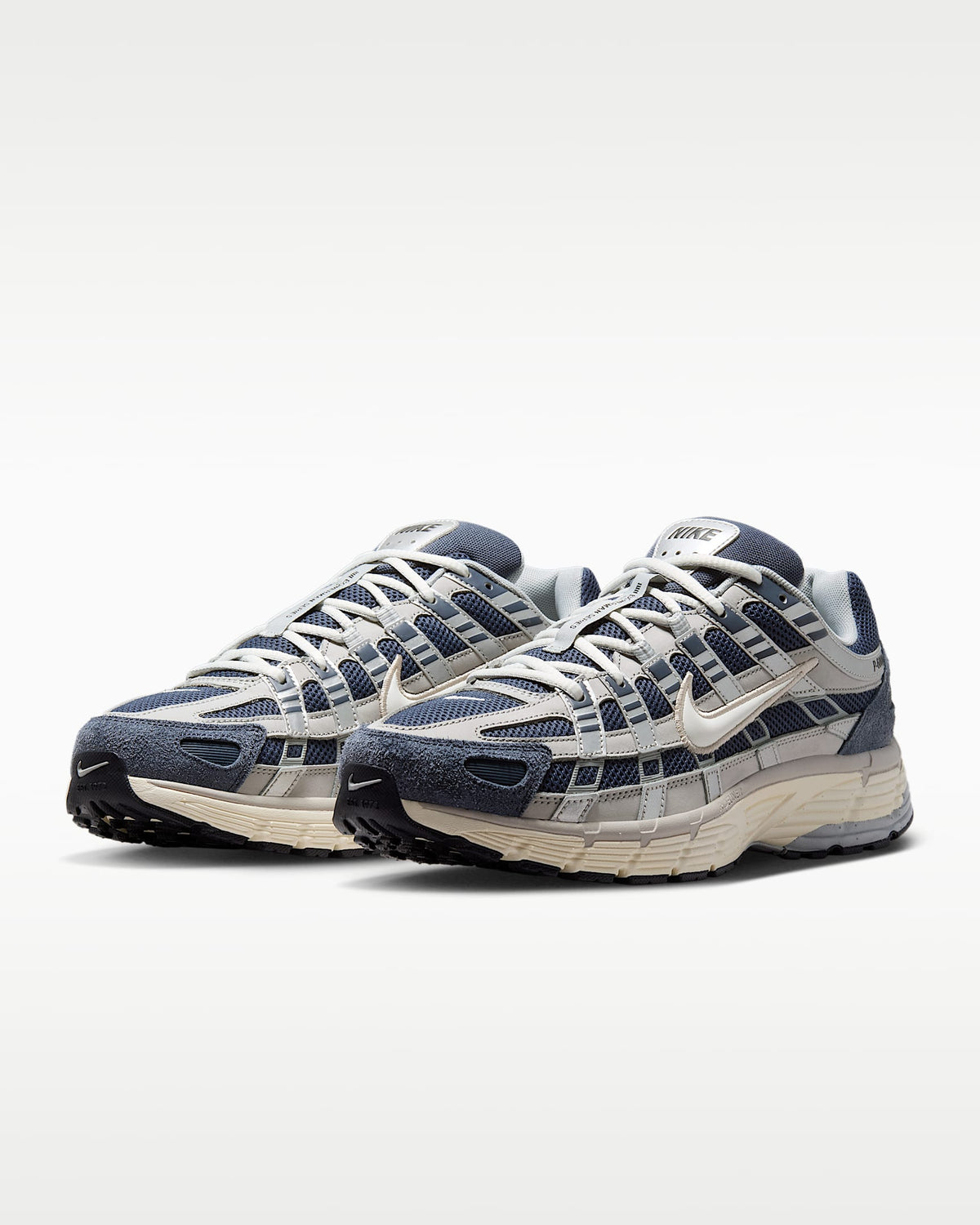 Nike P-6000 – Navy / Beige / Grey Mesh Athletic Sneakers