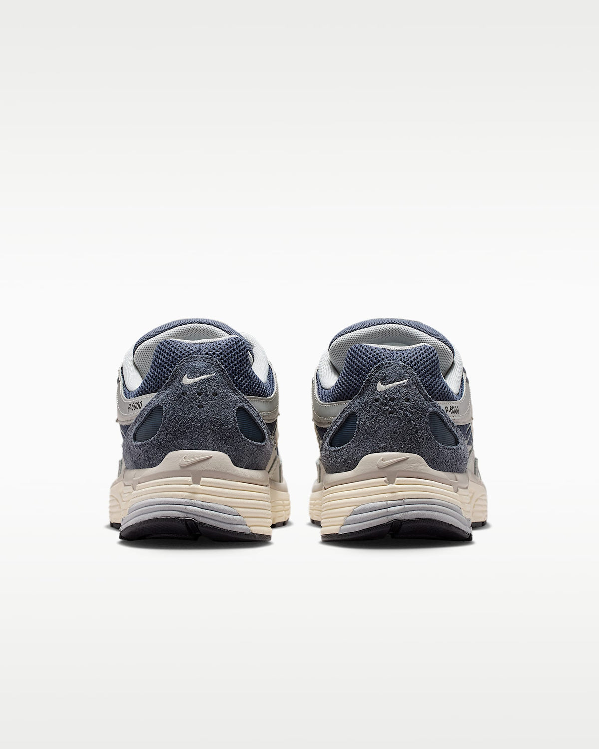 Nike P-6000 – Navy / Beige / Grey Mesh Athletic Sneakers